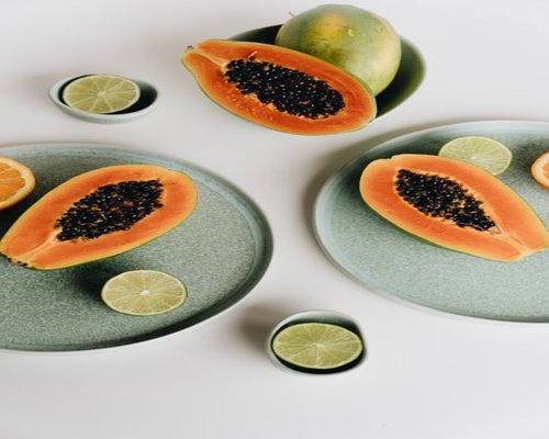 Slices of fresh ripe papaya on a serving plate